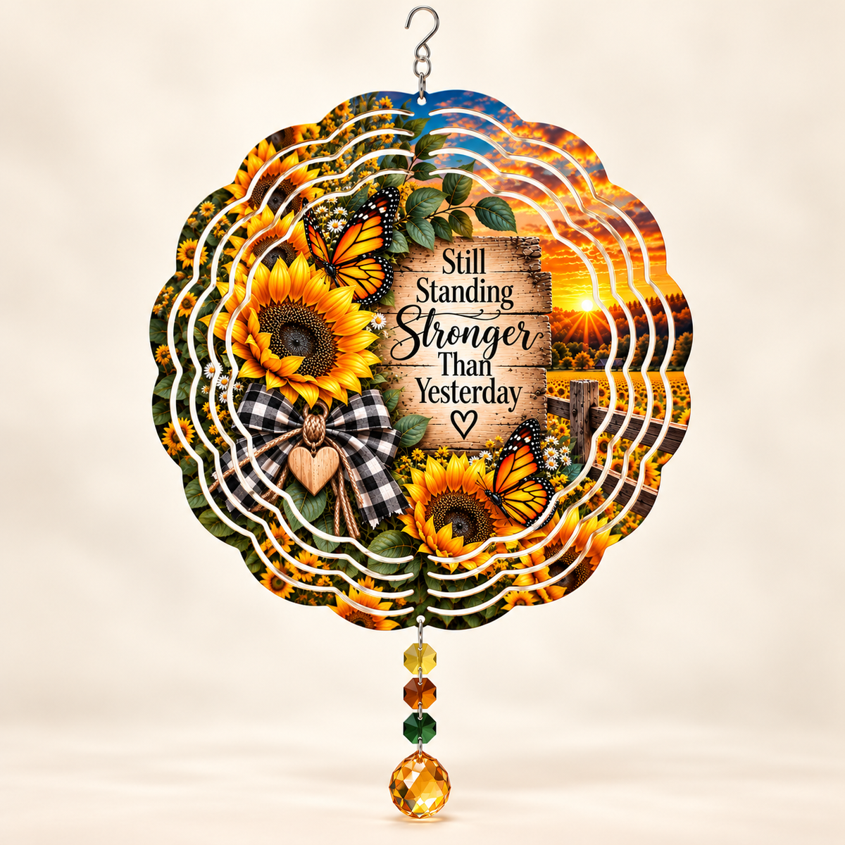 Illustrative front mockup of Still Standing sunflower butterfly 8-inch wind spinner with example amber yellow green prisms